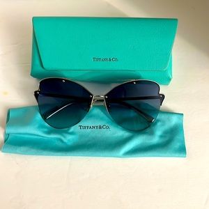 Tiffany & co stainless steal frame with light blue scratch less leans